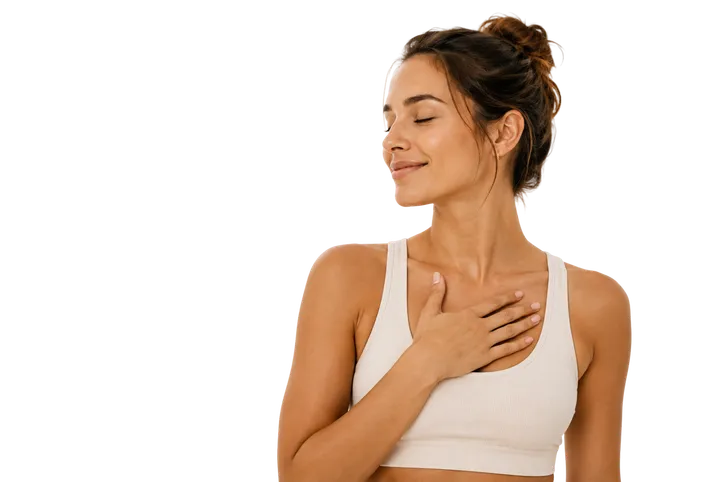 Woman with closed eyes resting a hand on her chest